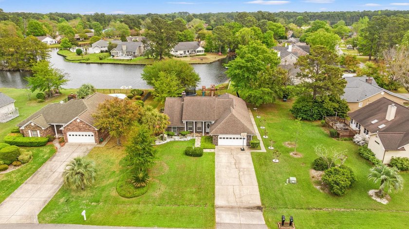 Custom built all-brick home, with a large private pool, on a - photo 41
