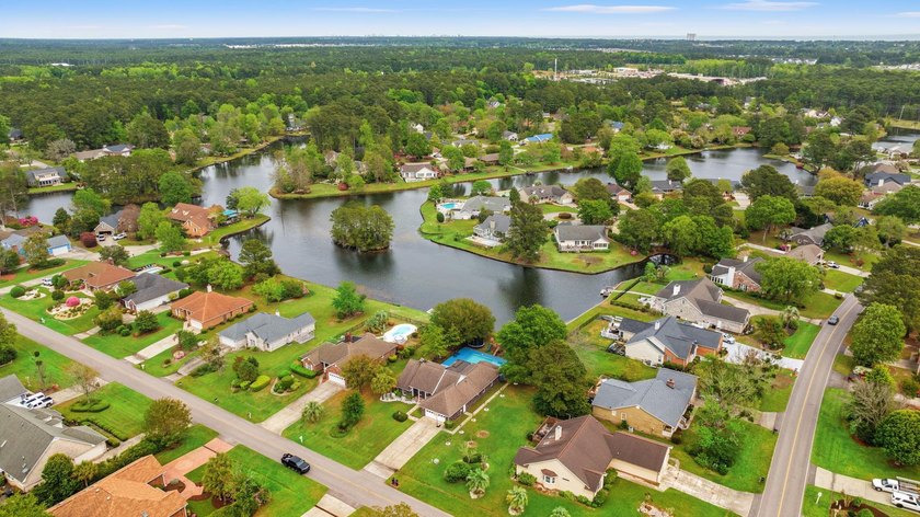Custom built all-brick home, with a large private pool, on a - photo 44