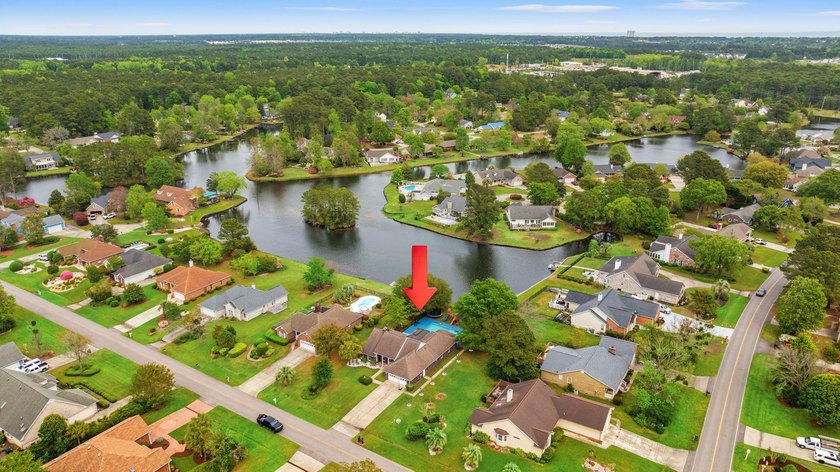 Custom built all-brick home, with a large private pool, on a - photo 45