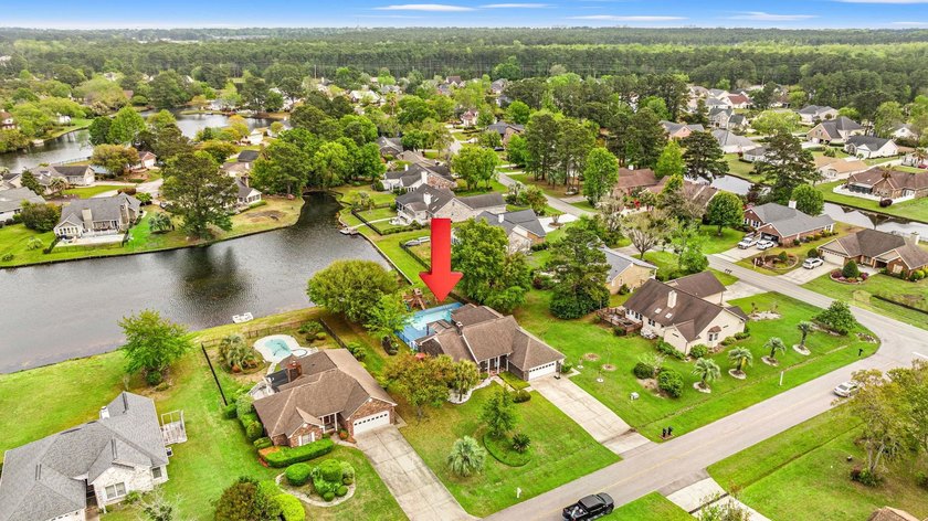 Custom built all-brick home, with a large private pool, on a - photo 47