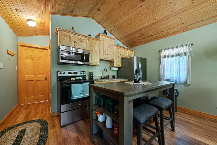 Unrestricted, Lakefront Tiny Home on 5.74 acres! - photo 11