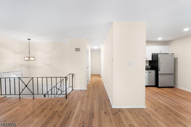Welcome to this newly renovated bilevel, positioned perfectly on - photo 12