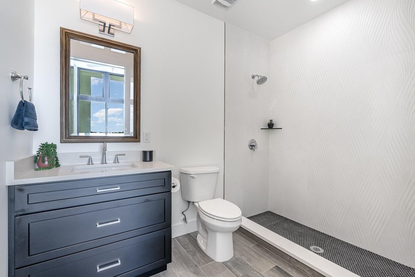 Seller motivated! Discover elevated ocean-to-river luxury- - photo 17