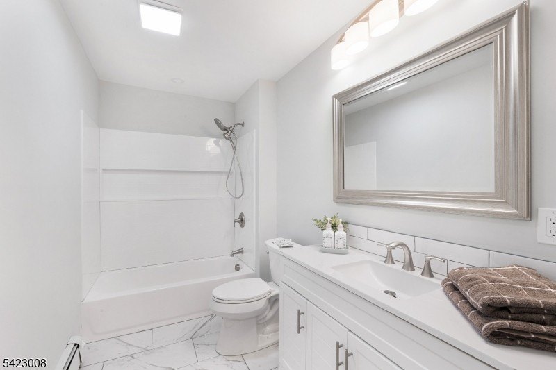 Welcome to this newly renovated bilevel, positioned perfectly on - photo 18