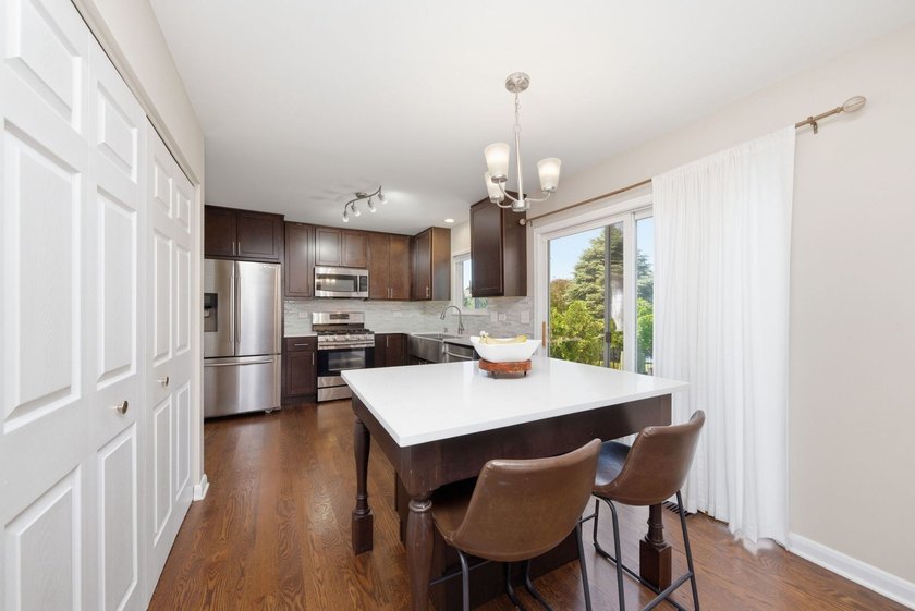 Welcome Home to Waterfront Living! Perfectly positioned on a - photo 6