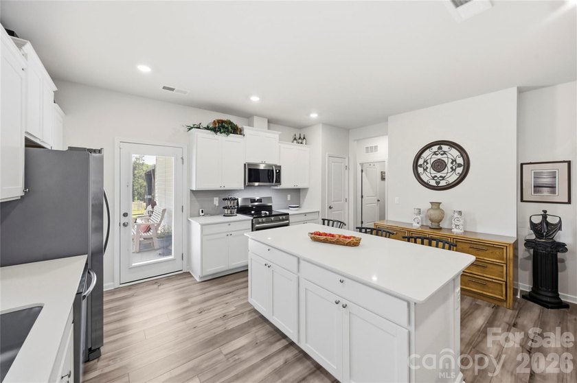 Welcome to this beautiful chiffon plan ranch home featuring an - photo 10