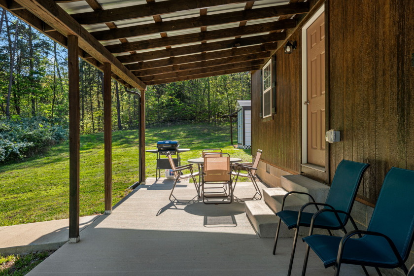 Unrestricted, Lakefront Tiny Home on 5.74 acres! - photo 16