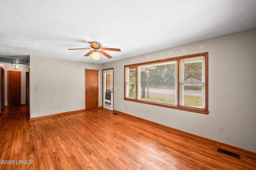 Welcome home to this turnkey 3-bedroom, 2-bath home, 2 miles - photo 4