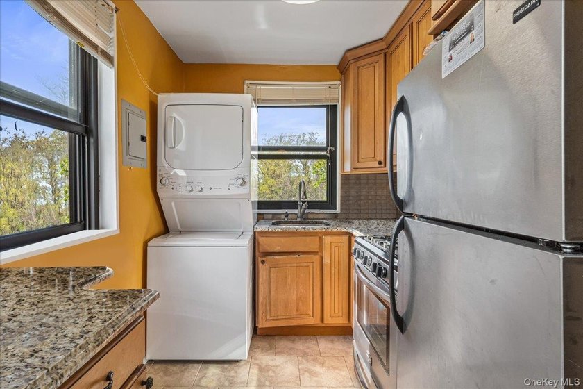 Welcome to this bright one-bedroom upper unit in the highly - photo 5