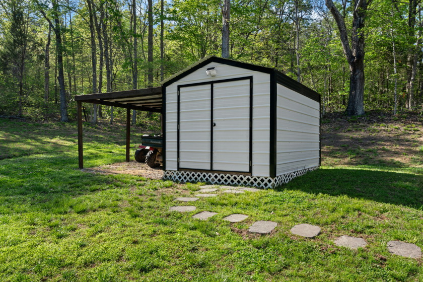 Unrestricted, Lakefront Tiny Home on 5.74 acres! - photo 17