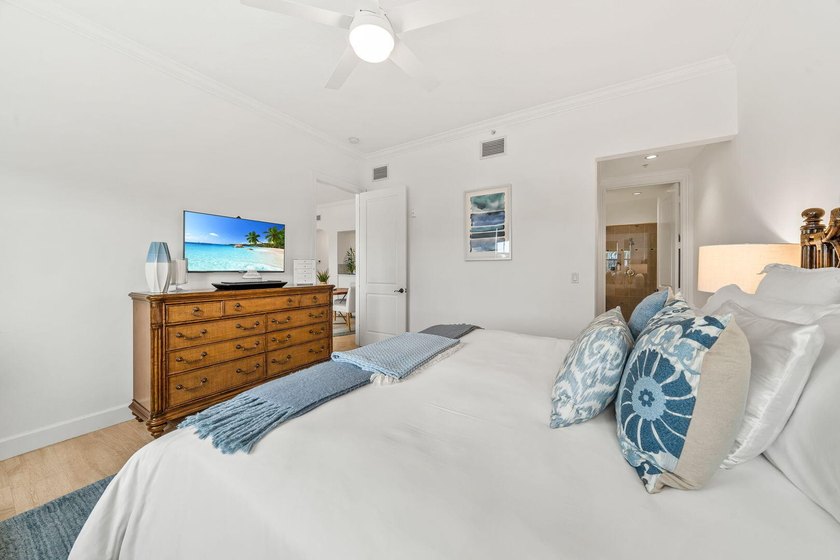 This stunningly upgraded 2-bedroom, 2-bath condo puts you steps - photo 22