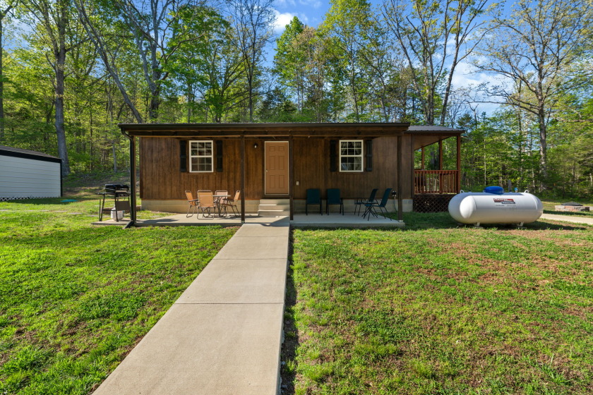 Unrestricted, Lakefront Tiny Home on 5.74 acres! - photo 3