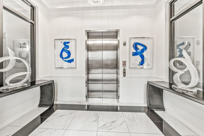 This stunningly upgraded 2-bedroom, 2-bath condo puts you steps - photo 31