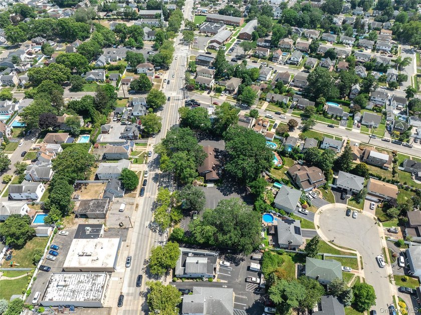 Nestled in the heart of Bellmore, New York, welcome to Oak - photo 16