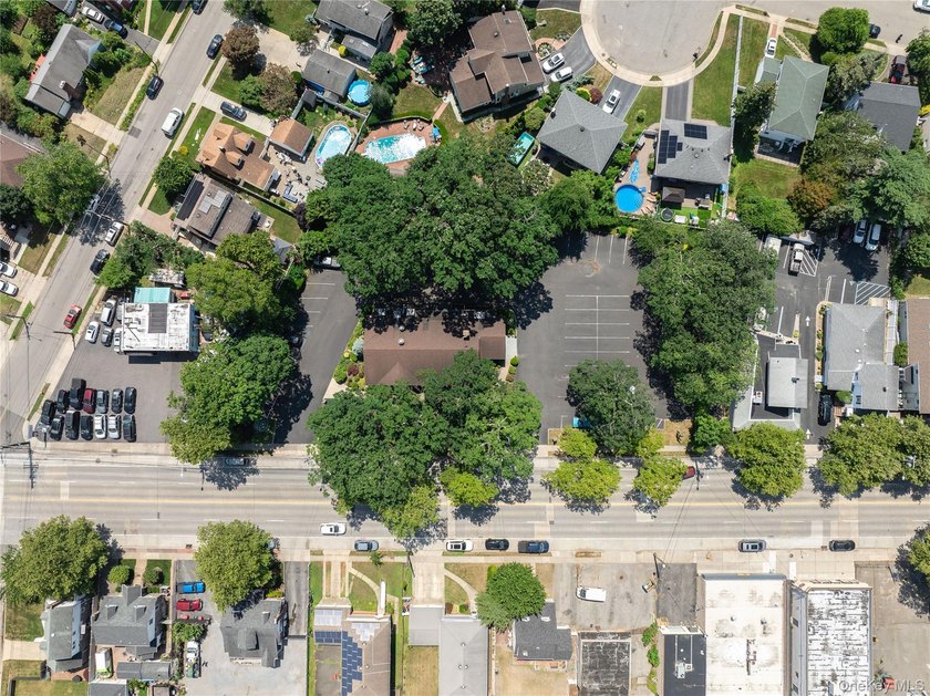 Nestled in the heart of Bellmore, New York, welcome to Oak - photo 18