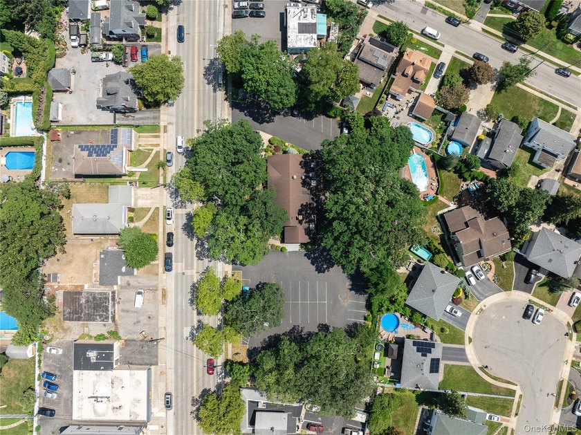 Nestled in the heart of Bellmore, New York, welcome to Oak - photo 19