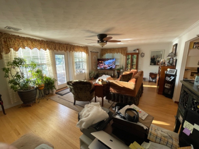 living room - lots of windows to see the lake - photo 10