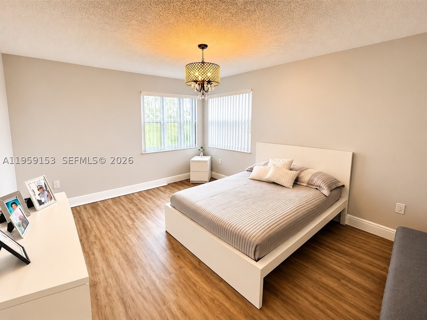 spacious 3-bedroom, 2.5-bath corner unit with 1,760 sq ft in the - photo 11