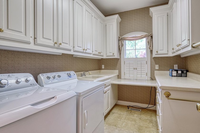 Welcome to 234 N Lake Emory Drive, a stately lakefront residence - photo 12