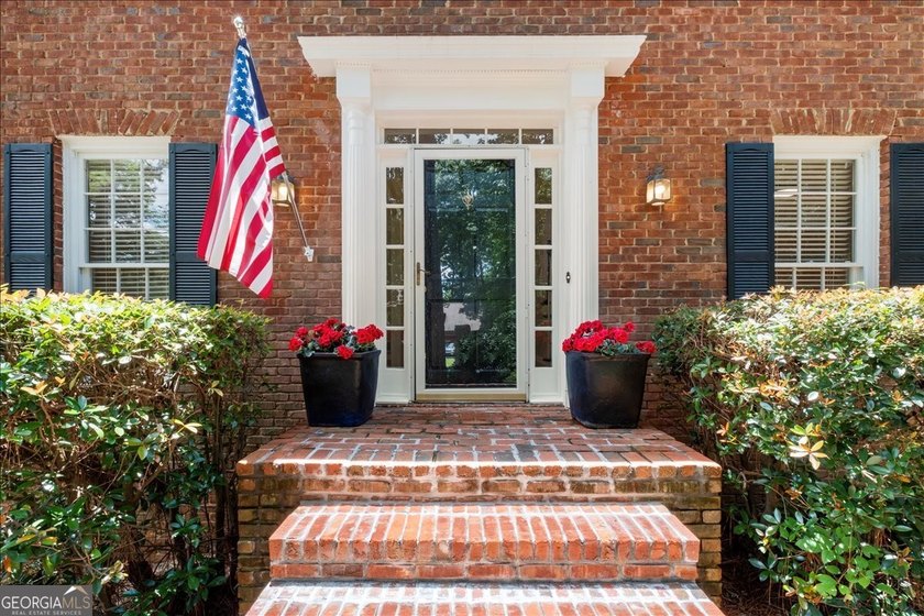 Traditional brick home on a lovely wooded lot near the best of - photo 10