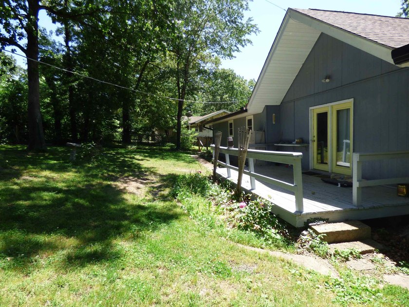 Surrounded by mature trees and just minutes from Crown Lake this - photo 31