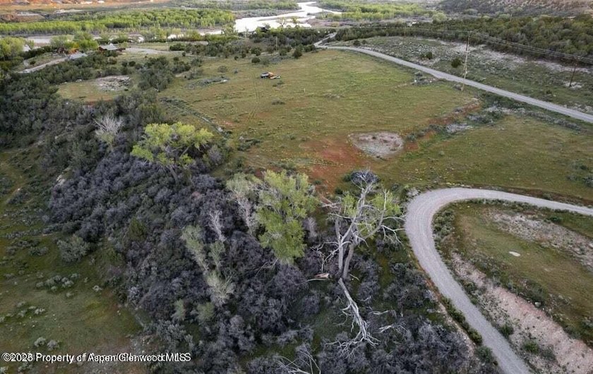 Stunning Riverfront Acreage with Unmatched Views! Discover a - photo 3