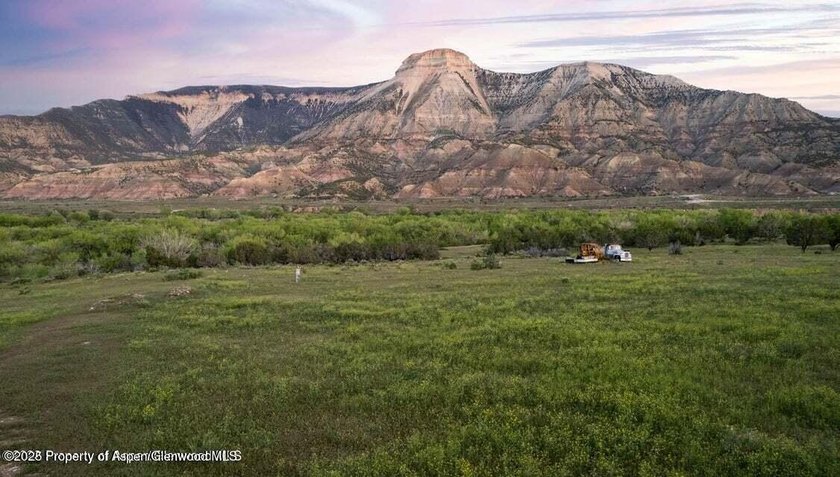 Stunning Riverfront Acreage with Unmatched Views! Discover a - photo 9