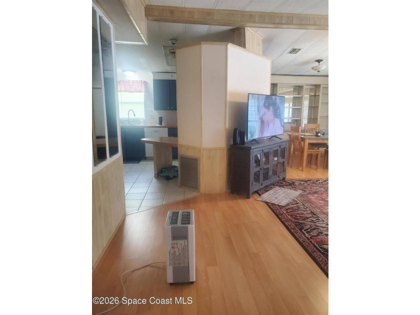 This 2-bedroom 2-bathroom home is a great opportunity for an - photo 6