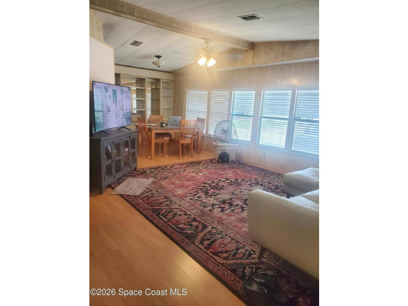 This 2-bedroom 2-bathroom home is a great opportunity for an - photo 7