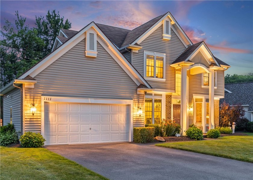 Welcome to 1111 Brick Landing Place, an updated Colonial with - photo 3