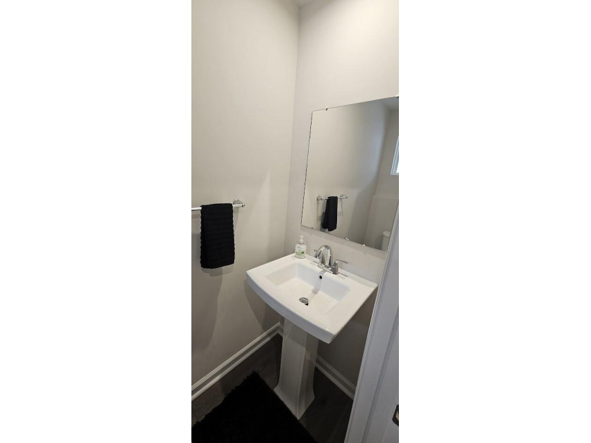 Sold Fully Furnish! Welcome to coastal living at its finest in - photo 5