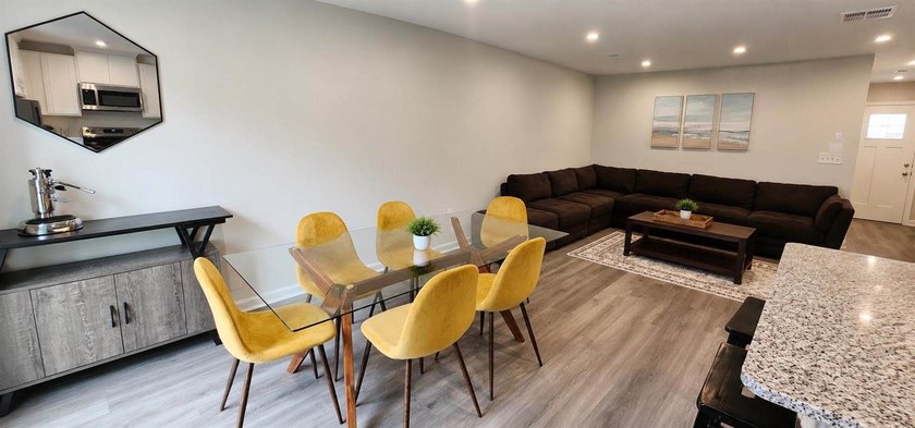 Sold Fully Furnish! Welcome to coastal living at its finest in - photo 7