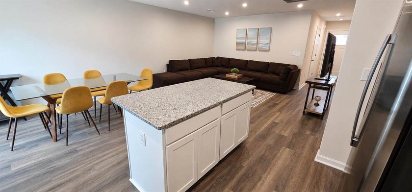 Sold Fully Furnish! Welcome to coastal living at its finest in - photo 9