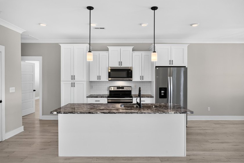 Luxury living with pond views and NO HOA!! Welcome to this - photo 14