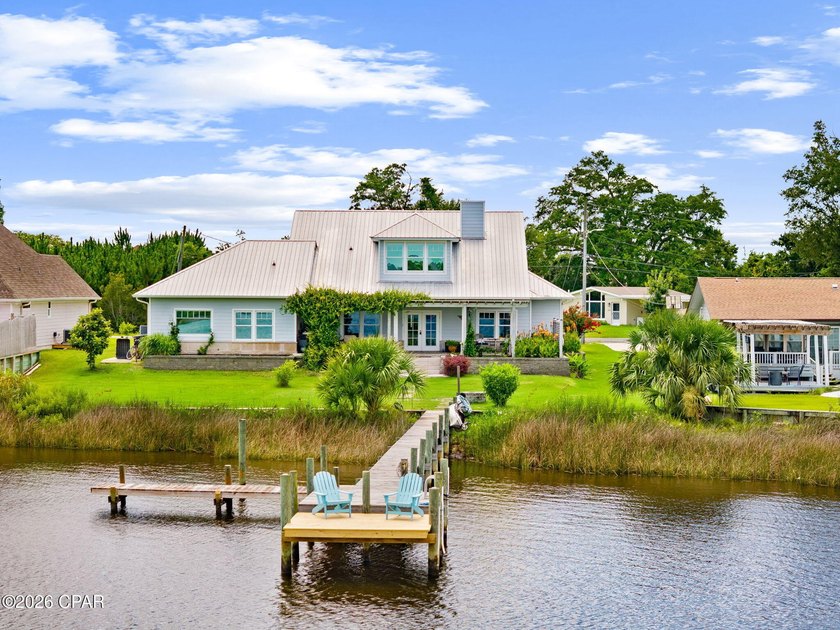Experience waterfront living at its finest on picturesque Mill - photo 3