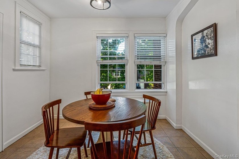 Exquisite Tudor attached townhouse nestled on a gorgeous, quiet - photo 9