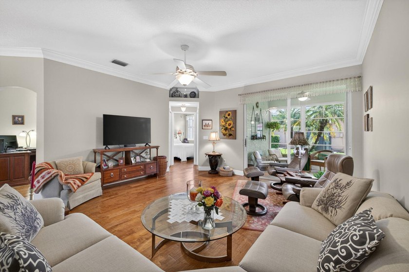 Situated on a large corner lot with lush tropical landscaping - photo 19