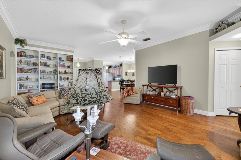 Situated on a large corner lot with lush tropical landscaping - photo 21