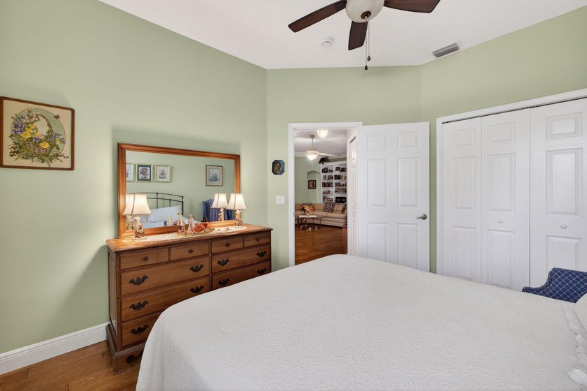 Situated on a large corner lot with lush tropical landscaping - photo 23