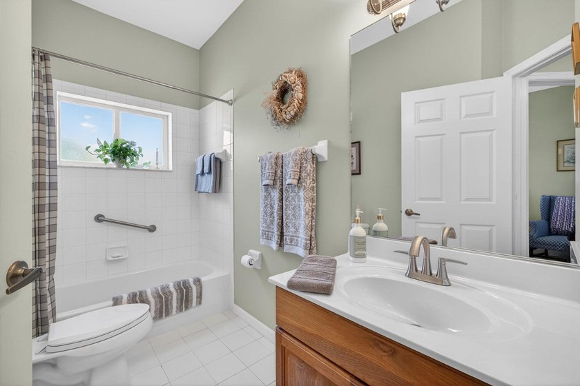 Situated on a large corner lot with lush tropical landscaping - photo 24
