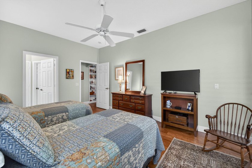 Situated on a large corner lot with lush tropical landscaping - photo 26