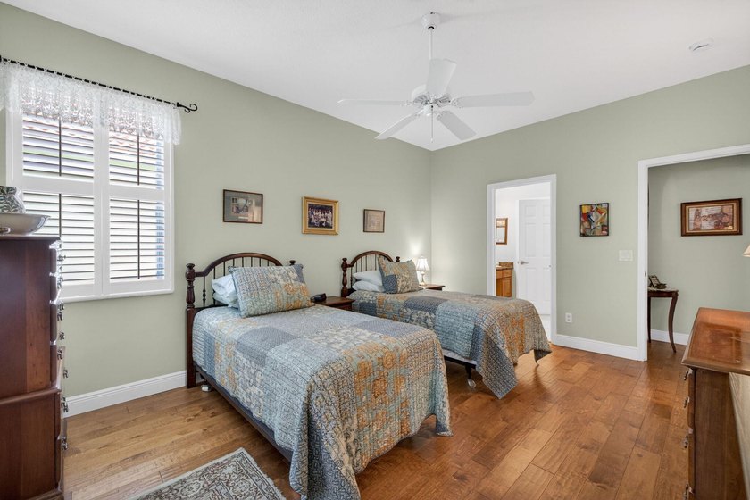 Situated on a large corner lot with lush tropical landscaping - photo 27