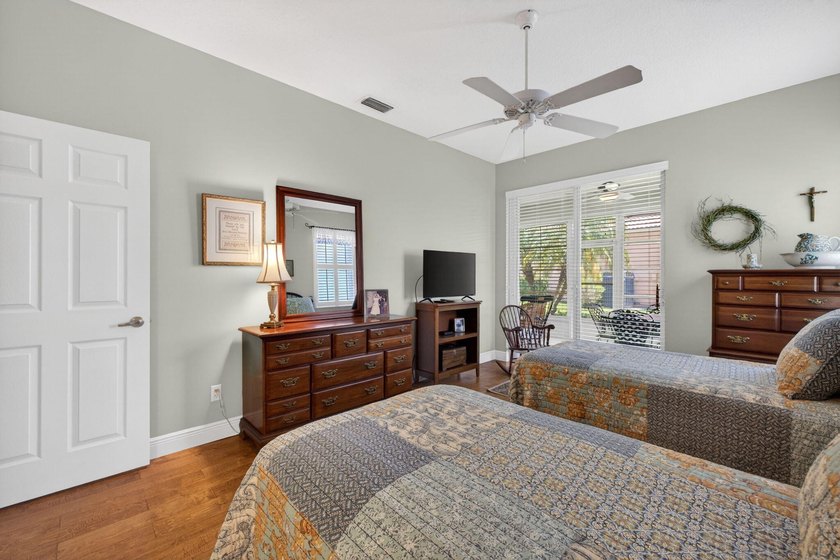 Situated on a large corner lot with lush tropical landscaping - photo 28