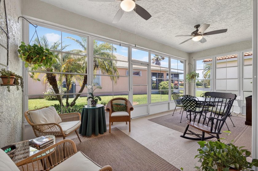 Situated on a large corner lot with lush tropical landscaping - photo 33