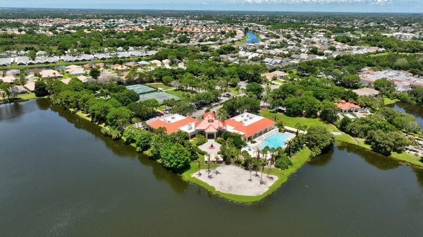 Situated on a large corner lot with lush tropical landscaping - photo 41