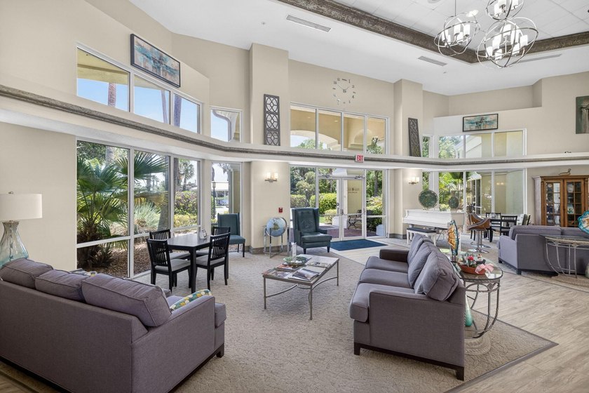 Situated on a large corner lot with lush tropical landscaping - photo 44