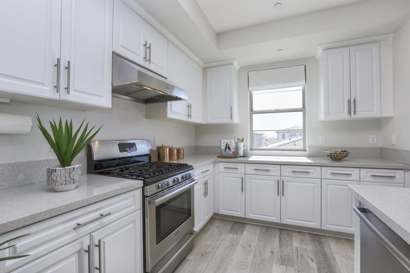 Welcome to 1089 Dewberry Place #401, a stunning top-floor corner - photo 11