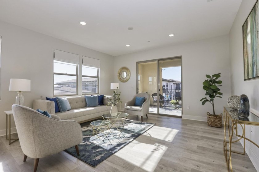 Welcome to 1089 Dewberry Place #401, a stunning top-floor corner - photo 17