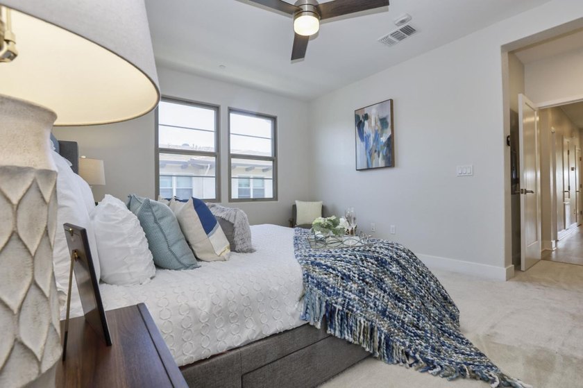 Welcome to 1089 Dewberry Place #401, a stunning top-floor corner - photo 26