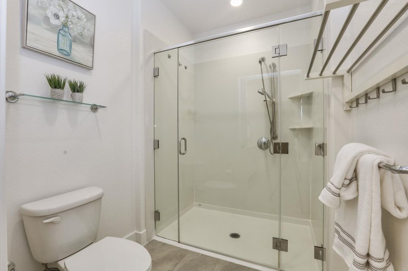 Welcome to 1089 Dewberry Place #401, a stunning top-floor corner - photo 30